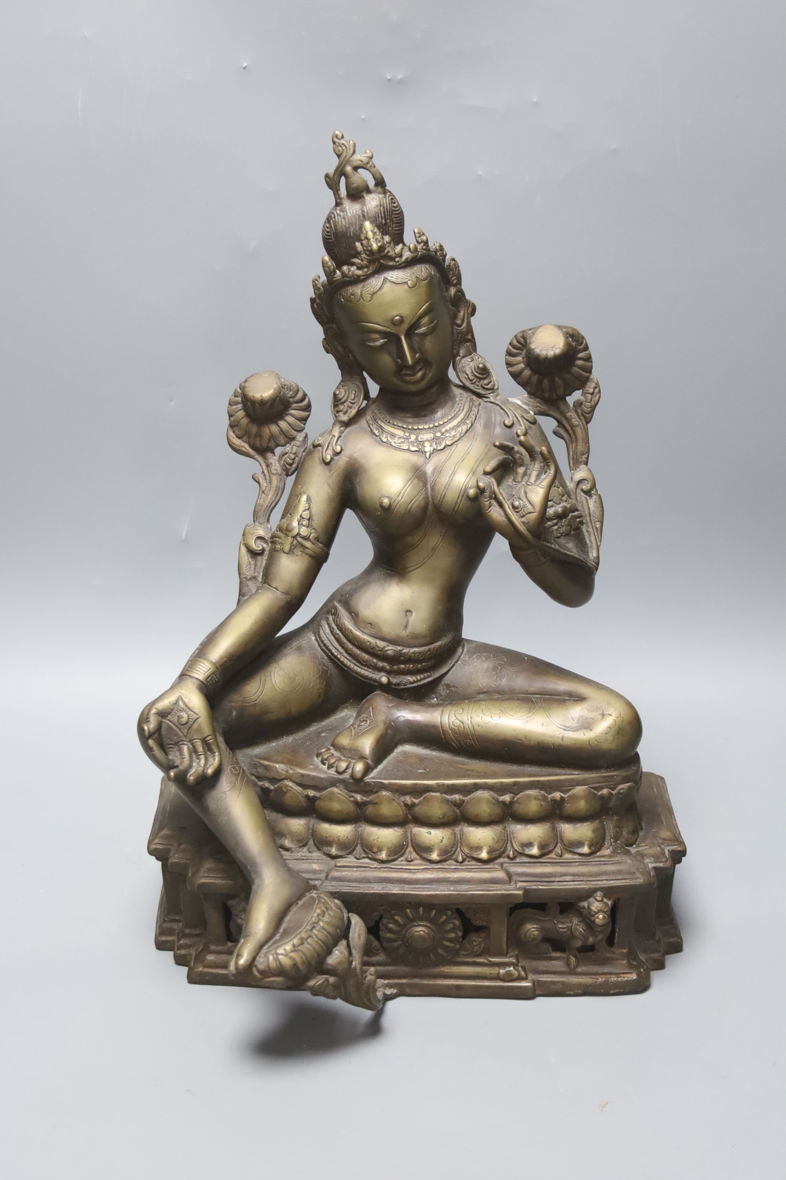 A large Himalayan bronze figure of Green Tara, early 20th century, 42cm